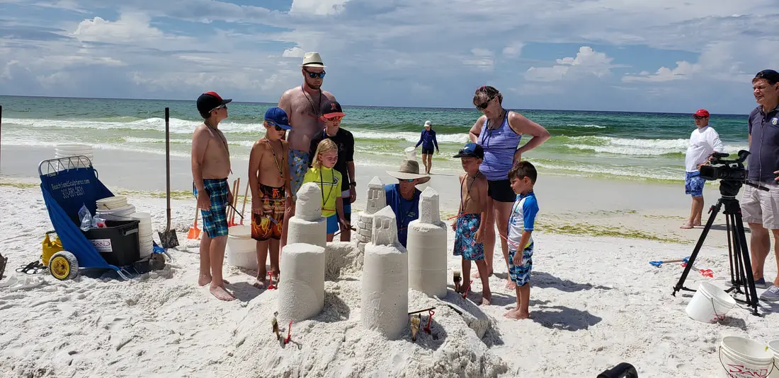Picture of people building sandcastle Destin FL