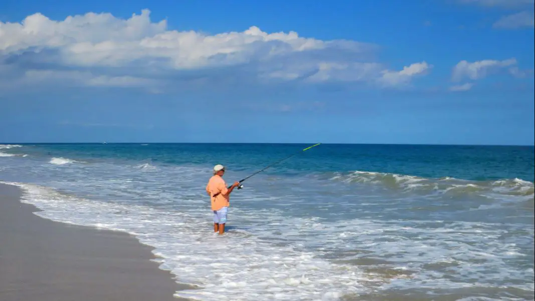 Picture of man surf fishing Vero Beach