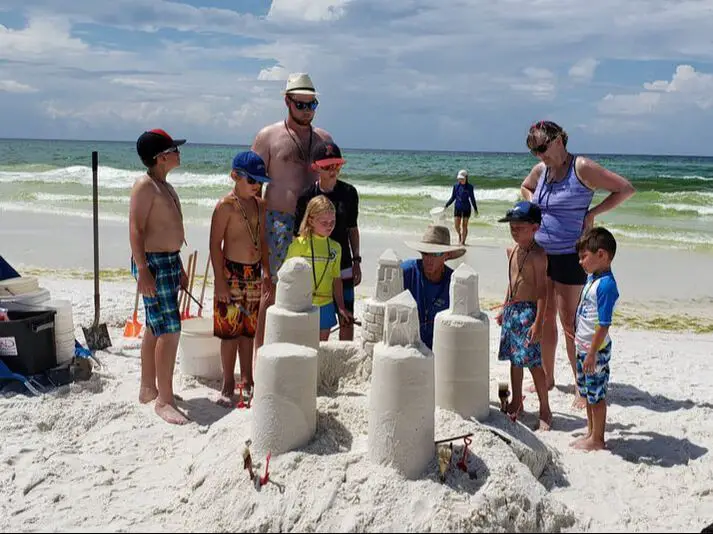 Picture of people building sandcastle Destin FL