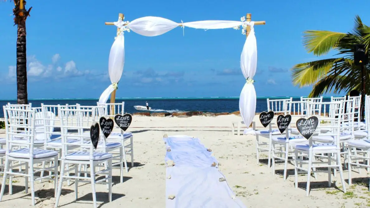 Picture of wedding arch and chairs on beach