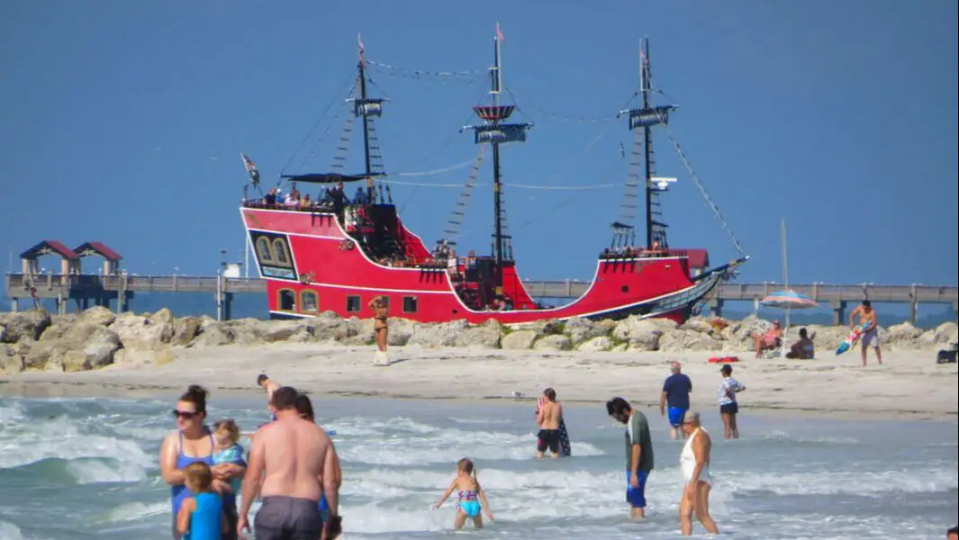 Pirate ship sails past Clearwater beach swimmers