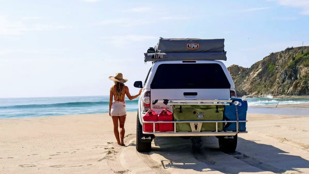Hitch mounted cargo rack on beach truck